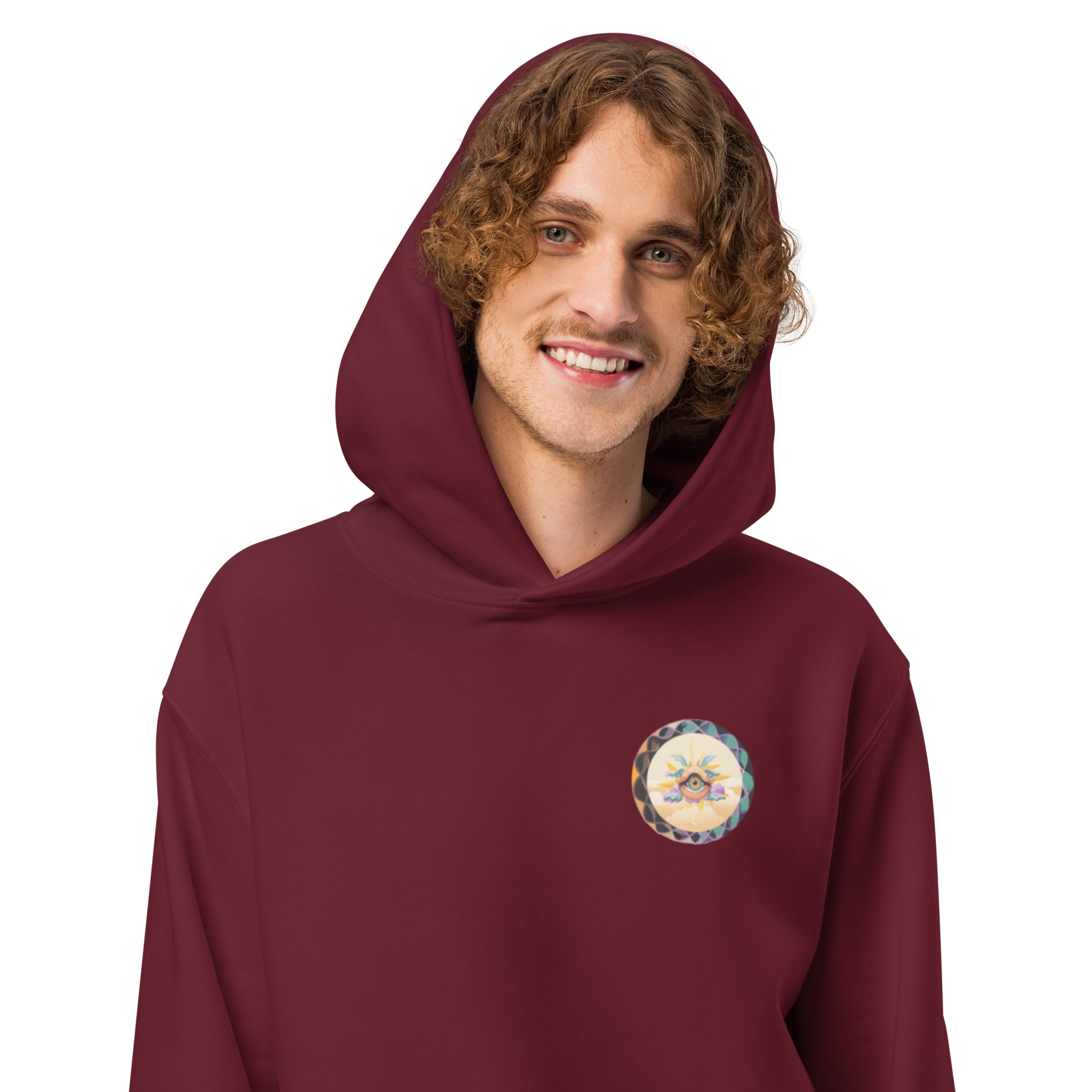 Male model in maroon oversized hoodie, eco-friendly streetwear style for mens festival outfits and cool graphic hoodies.